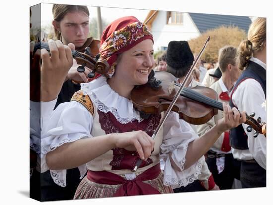 Woman Playing Violin and Wearing Folk Dress, Borsice, Brnensko, Czech Republic-Richard Nebesky-Premier Image Canvas