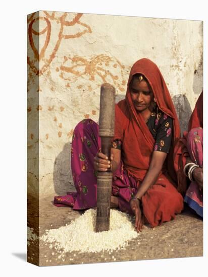 Woman Pounding Food in Village Near Deogarh, Rajasthan State, India-Robert Harding-Premier Image Canvas