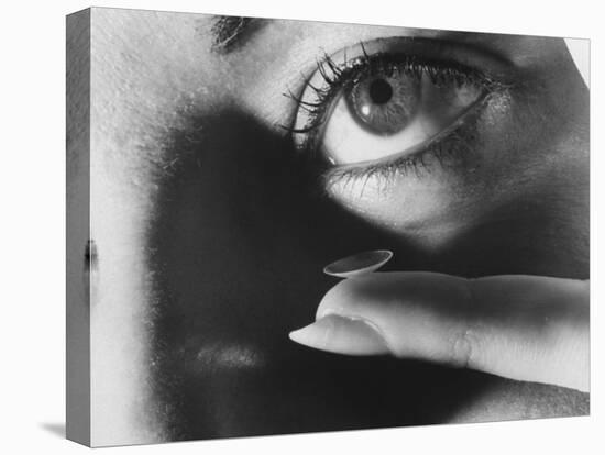 Woman Preparing to Insert Contact Lens Into Her Eye-Henry Groskinsky-Premier Image Canvas