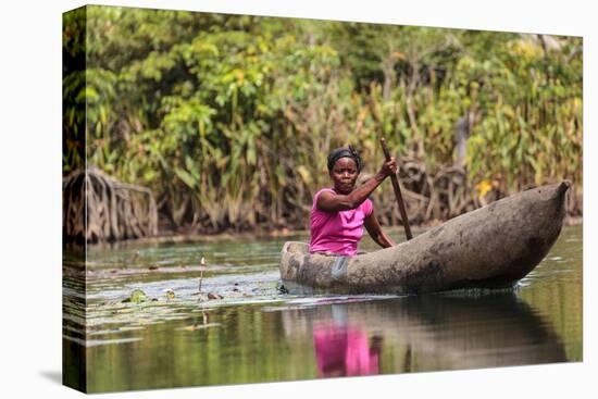 Woman Rowing Traditional Pirogue Down Du River, Monrovia, Liberia-Alida Latham-Premier Image Canvas