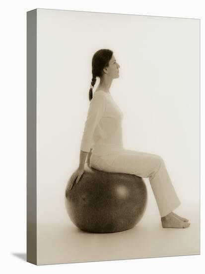 Woman Sitting on Exercise Ball-Cristina-Premier Image Canvas