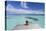 Woman Sitting on Jetty, Fakarava, Tuamotu Islands, French Polynesia (Mr)-Ian Trower-Premier Image Canvas