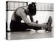 Woman Stretching During a Workout, New York, New York, USA-Paul Sutton-Premier Image Canvas