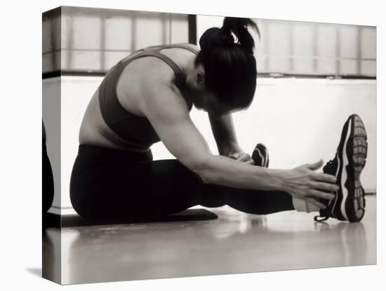 Woman Stretching During a Workout, New York, New York, USA-Paul Sutton-Premier Image Canvas