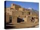 Woman Sweeping Up, in Front of the Adobe Buildings, Dating from 1450, Taos Pueblo, New Mexico, USA-Westwater Nedra-Premier Image Canvas