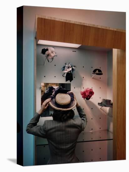 Woman Trying on Hats-Alfred Eisenstaedt-Premier Image Canvas