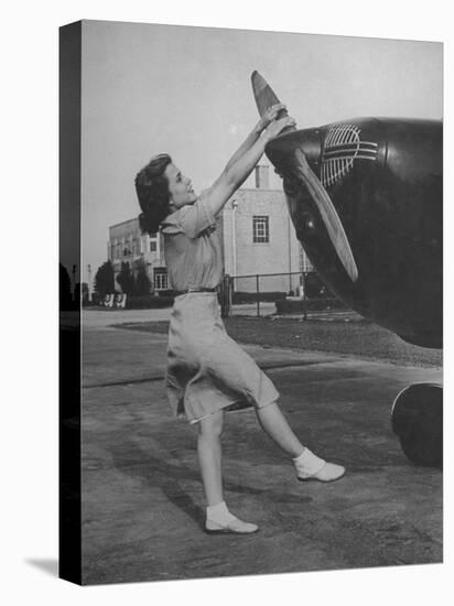 Woman Turning Propeller to Start Plane-David Scherman-Premier Image Canvas