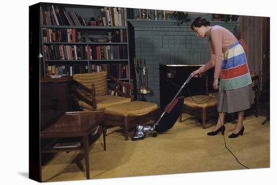 Woman Vacuuming Living Room-William P. Gottlieb-Premier Image Canvas