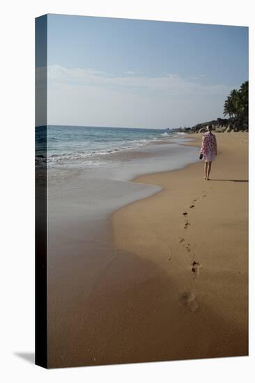 Woman Walking Leaving Footprints on Deserted Beach, Niraamaya, Kovalam, Kerala, India, Asia-James Strachan-Premier Image Canvas