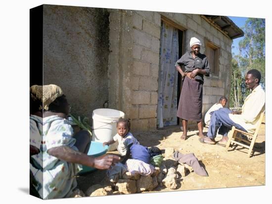 Woman Washing Clothes Outside Shack, Godet, Haiti, Island of Hispaniola-Lousie Murray-Premier Image Canvas