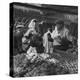 Woman with a Small Terrier Buying Bagels at a Market Stall, Possibly London, C.1945-50-null-Premier Image Canvas