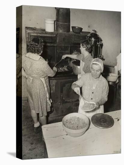 Women Cooking Spaghetti and Frying Chicken on an Old Stove for the Grape Festival-null-Stretched Canvas