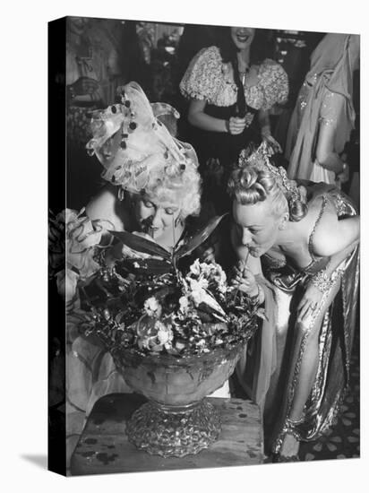 Women Sipping Punch Out of Big Bowl at Globetrotters Costume Party-Peter Stackpole-Premier Image Canvas