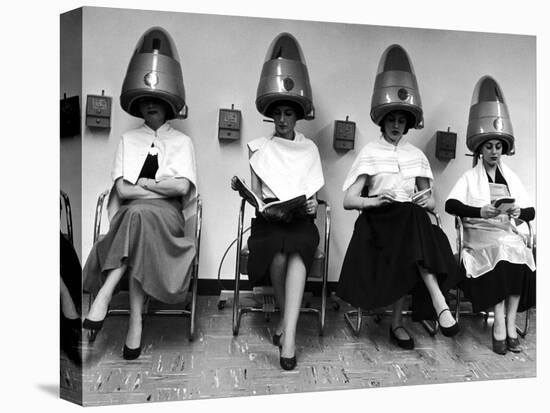 Women Sitting and Reading under Hairdryers at Rockefeller Center "Pamper Club"-Nina Leen-Premier Image Canvas