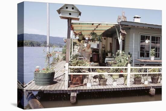 Women Standing Amidst Potted Plants on Floating Home Deck in Portage Bay, Seattle, Wa, 1971-Michael Rougier-Premier Image Canvas