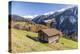 Wooden Cabin Surrounded by Colorful Woods and Snowy Peaks, Switzerland-Roberto Moiola-Premier Image Canvas