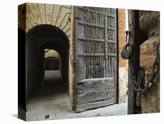 Wooden Fortified Gates and Alley of Medieval Town, Buonconvento, Italy-Dennis Flaherty-Premier Image Canvas