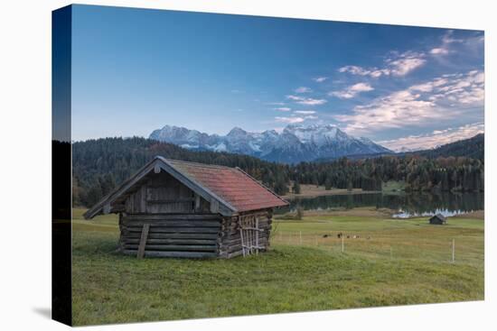 Wooden hut frames the alpine lake surrounded by the Alps, Geroldsee, Krun, Garmisch Partenkirchen, -Roberto Moiola-Premier Image Canvas