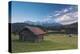 Wooden hut frames the alpine lake surrounded by the Alps, Geroldsee, Krun, Garmisch Partenkirchen, -Roberto Moiola-Premier Image Canvas