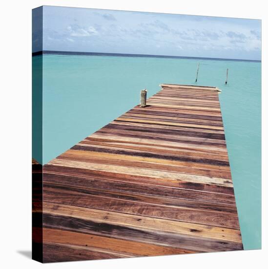 Wooden jetty leading out to sea-null-Premier Image Canvas