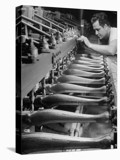 Worker Carving Chair Legs, 24 at a Time, at a Tomlinson Furniture Factory-Margaret Bourke-White-Premier Image Canvas