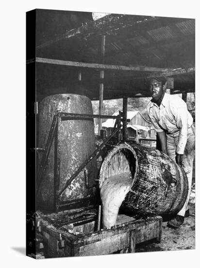 Worker Pouring Gum from Pine Trees into a Still During Turpentine Production-Hansel Mieth-Premier Image Canvas