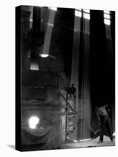 Worker Shoveling Limestone Into an Electric Blast Furnace at Republic Steel Mill-Margaret Bourke-White-Premier Image Canvas