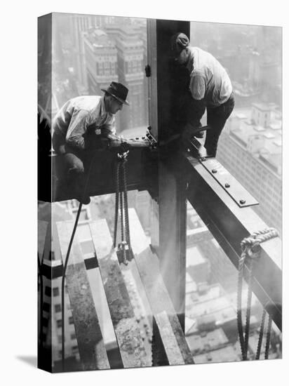 Workers balancing on steel beam above streets during construction of the Manhattan Company Building-Arthur Gerlach-Premier Image Canvas