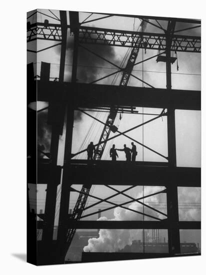 Workmen Against Smokey Sky as They Stand on Girders of the New Carnegie Illinois Steel Plant-Margaret Bourke-White-Premier Image Canvas