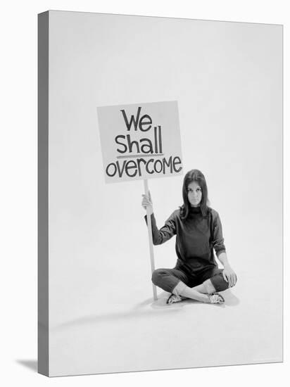 Writer Gloria Steinem Sitting on Floor with Sign "We Shall Overcome" Regarding Pop Culture-Yale Joel-Premier Image Canvas