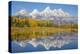 Wyoming, Grand Teton NP. Fresh snowfall covers the Grand Teton Mountains on an autumn morning-Elizabeth Boehm-Premier Image Canvas