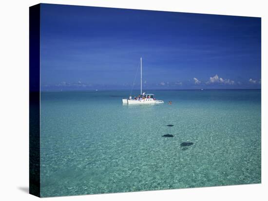 Yacht Moored in the North Sound, with Stringrays Visible Beneath the Water, Cayman Islands-Tomlinson Ruth-Premier Image Canvas