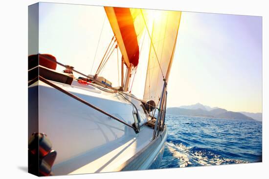 Yacht Sailing Against Sunset. Sailboat. Yachting. Sailing. Travel Concept. Vacation-Subbotina Anna-Premier Image Canvas