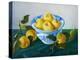 yellow apples in blue and white bowl-Cristiana Angelini-Premier Image Canvas