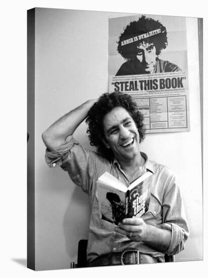 Yippie Leader Abbie Hoffman Holding Copy of His Book-John Shearer-Premier Image Canvas