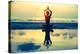 Yoga Woman Sitting In Lotus Pose On The Beach During Sunset-De Visu-Stretched Canvas