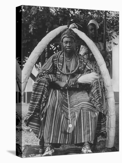Yoruba Tribal Ruler in West Nigeria on Throne Surrounded by Elephant Tusks-null-Premier Image Canvas