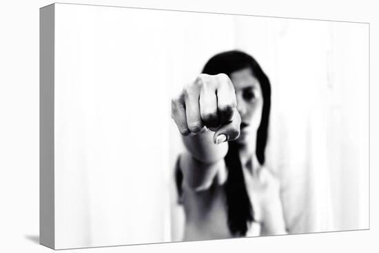 Young Adult Female with Arm Outstretched Like Punch-Torsten Richter-Premier Image Canvas