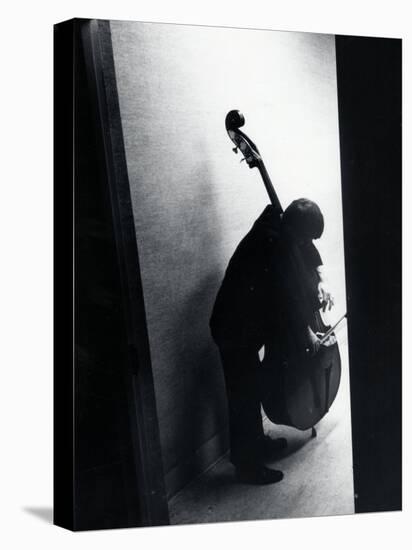 Young Bassist Member of Alexander Schneider's New York String Orchestra Tuning His Instrument-Gjon Mili-Premier Image Canvas