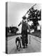 Young Boy and His Dog Walking Home from Fishing-Myron Davis-Premier Image Canvas