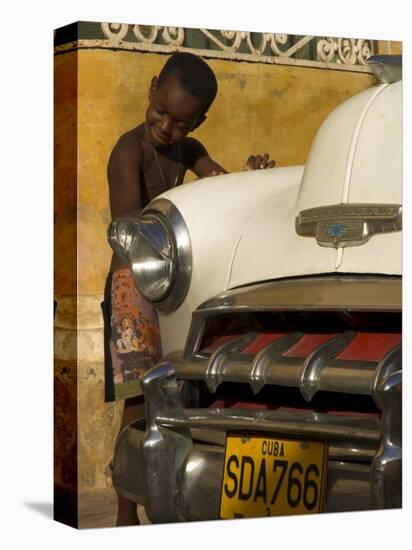 Young Boy Drumming on Old American Car's Bonnet,Trinidad, Sancti Spiritus Province, Cuba-Eitan Simanor-Premier Image Canvas