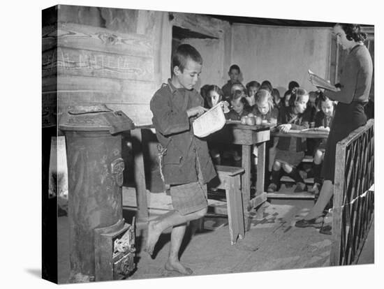 Young Boy Reading Allowed to the Class-null-Premier Image Canvas