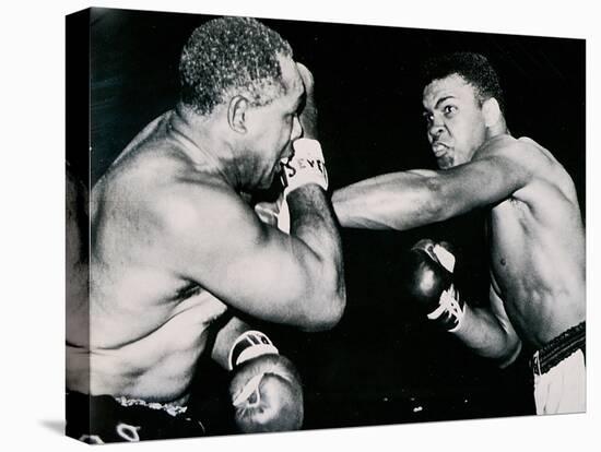 Young Cassius Clay Scores with a Left Against the Veteran Archie Moore in the First Round of the?-American Photographer-Premier Image Canvas