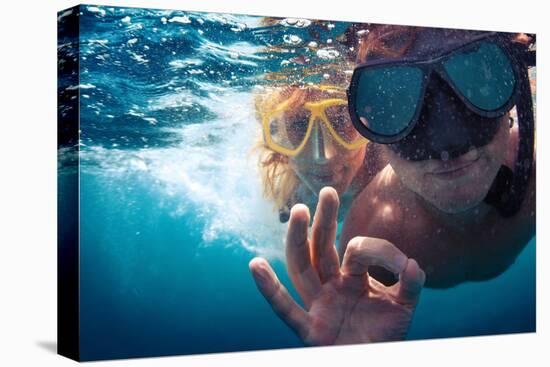 Young Couple Having Fun Underwater and Showing Ok Sign-Dudarev Mikhail-Premier Image Canvas