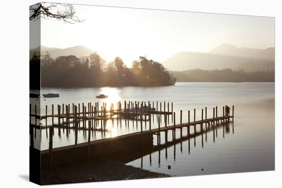 Young Couple on Pier, Sunset, Derwent Water, Cumbria, UK-Peter Adams-Premier Image Canvas