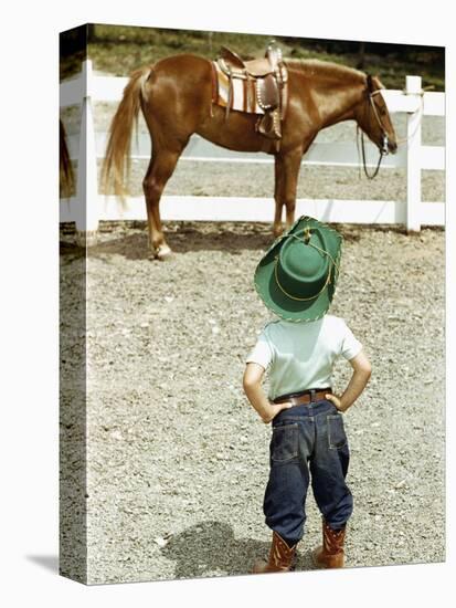 Young Cowboy Looking at Horse-William P. Gottlieb-Premier Image Canvas