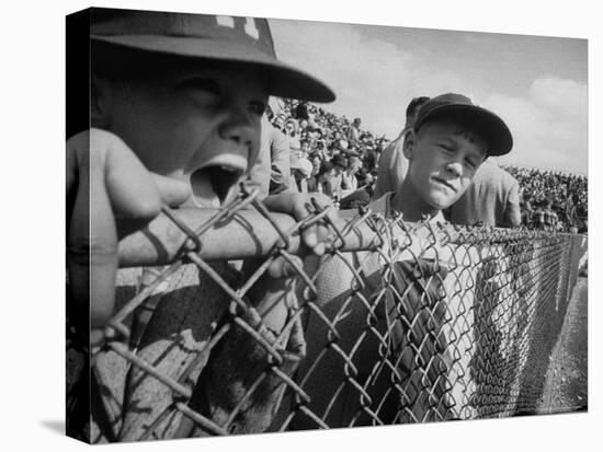 Young Fans Standing at Fence Which Borders Field at World Series Game, Braves vs. Yankees-Grey Villet-Premier Image Canvas