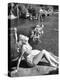 Young Girl Sunbathing at the Venetian Pool-Allan Grant-Premier Image Canvas