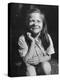 Young Girl with Long Hair and Raggedy Shirt, Smiling, Wearing Seed Pod on Nose-Ralph Morse-Premier Image Canvas