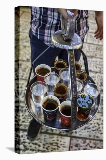 Young Man Holding a Tray with Coffee, Tea and Water in Old City, Jerusalem, Israel, Middle East-Yadid Levy-Premier Image Canvas